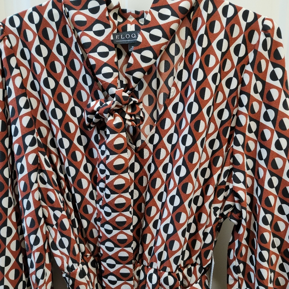 Printed pleated midi dress with belt.